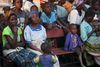 In Singano, Chikwawa, villagers wait their turn at a medical clinic.