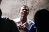 The chorus members of Chinamvuu sing joyfully, including this young man who stood in the back.