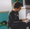Samuel reading to toddlers